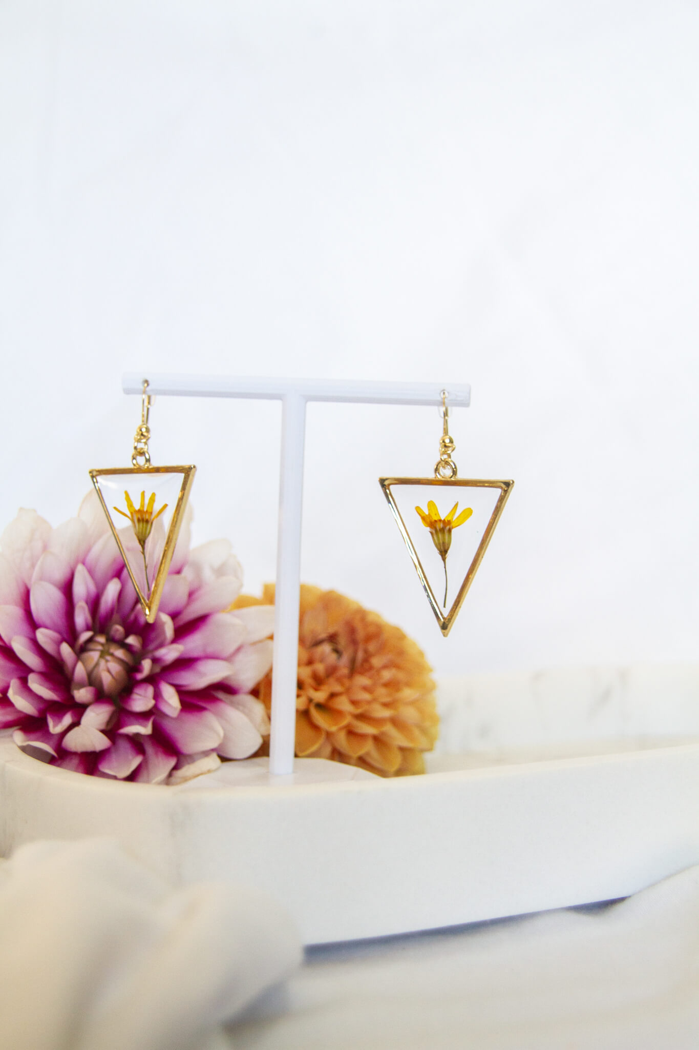 Botanical resin earrings: wild cineraria stainless -steel in gold earrings - shepherd hooks with 30mm large triangle pendants